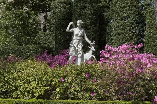 Statue of Diana, Roman goddess of the hunt and wild animals in pleasant gardens, in Houston, Texas
