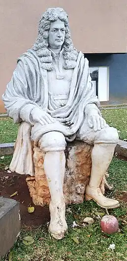 Statue of Isaac Newton in IUCAA with the representation of the iconic apple that fell from the tree