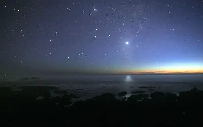 Morningstar - Venus reflected on the Pacific Ocean.