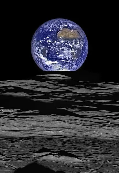 Over The Moon - The Earth straddling the limb of the Moon, as seen from above Compton crater