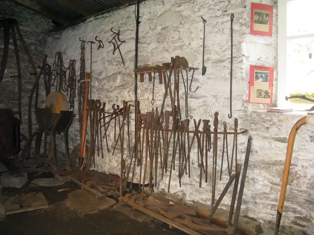 A fine assortment of tools, mostly for holding hot pieces of metal while working it, in the Strachur Smiddy Museum
