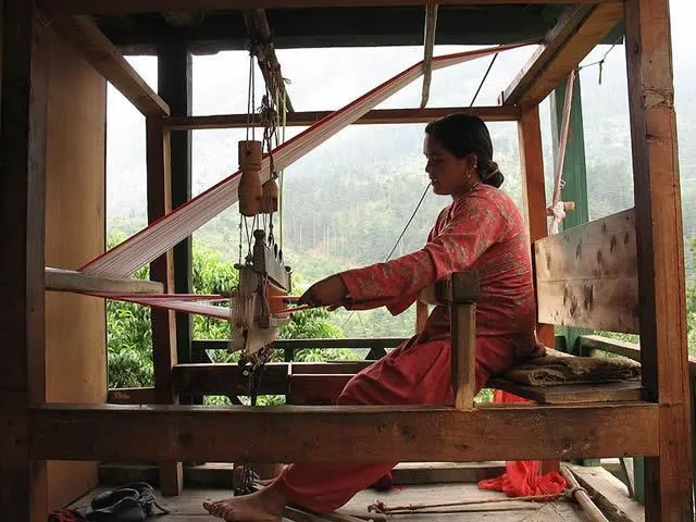 A woman weaving in a village named Jari in north India Weaver Image